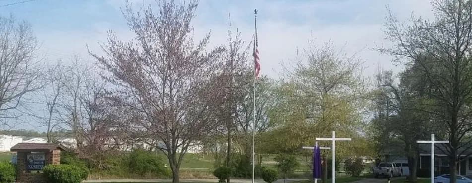 Three crosses and American flag at Eldon Church of the Nazarene